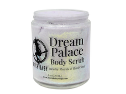 8 oz glass jar filled with lavender colored body scrub and gold glitter with clear label that reads: Dream Palace Body Scrub Beachy Florals & Hard Candy