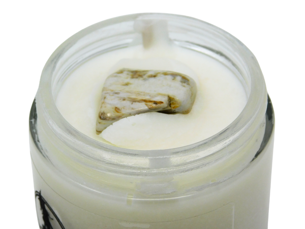 top view of petrified wood in winter cafeomancy body butter. 