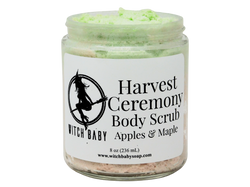 thick rich green and red scrub in 8 oz glass jar with label that reads: harvest ceremony body scrub. apples & maple.