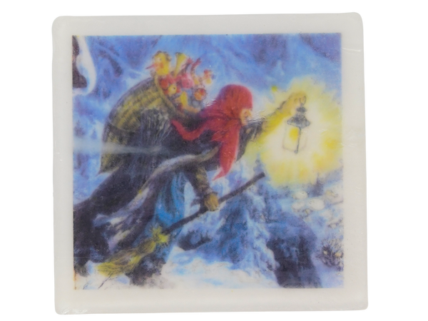 square soap with vintage illustration of la befana bringing gifts in the snow with her broom and a lantern