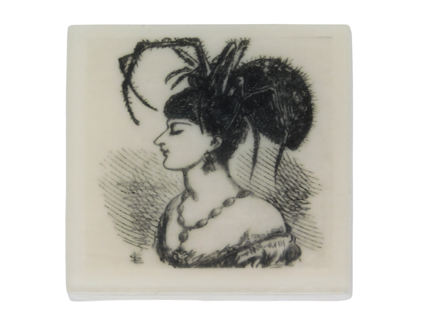 square soap with vintage illustration of a lady with a spider on her head