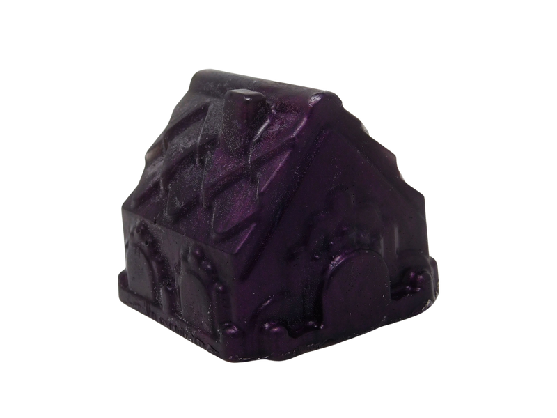 purple soap shaped like a house. White tint on the top that resembles snow.