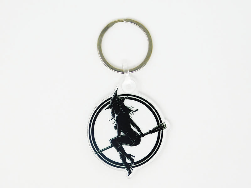 1.7" x 3.2 inch keychain with witch baby logo